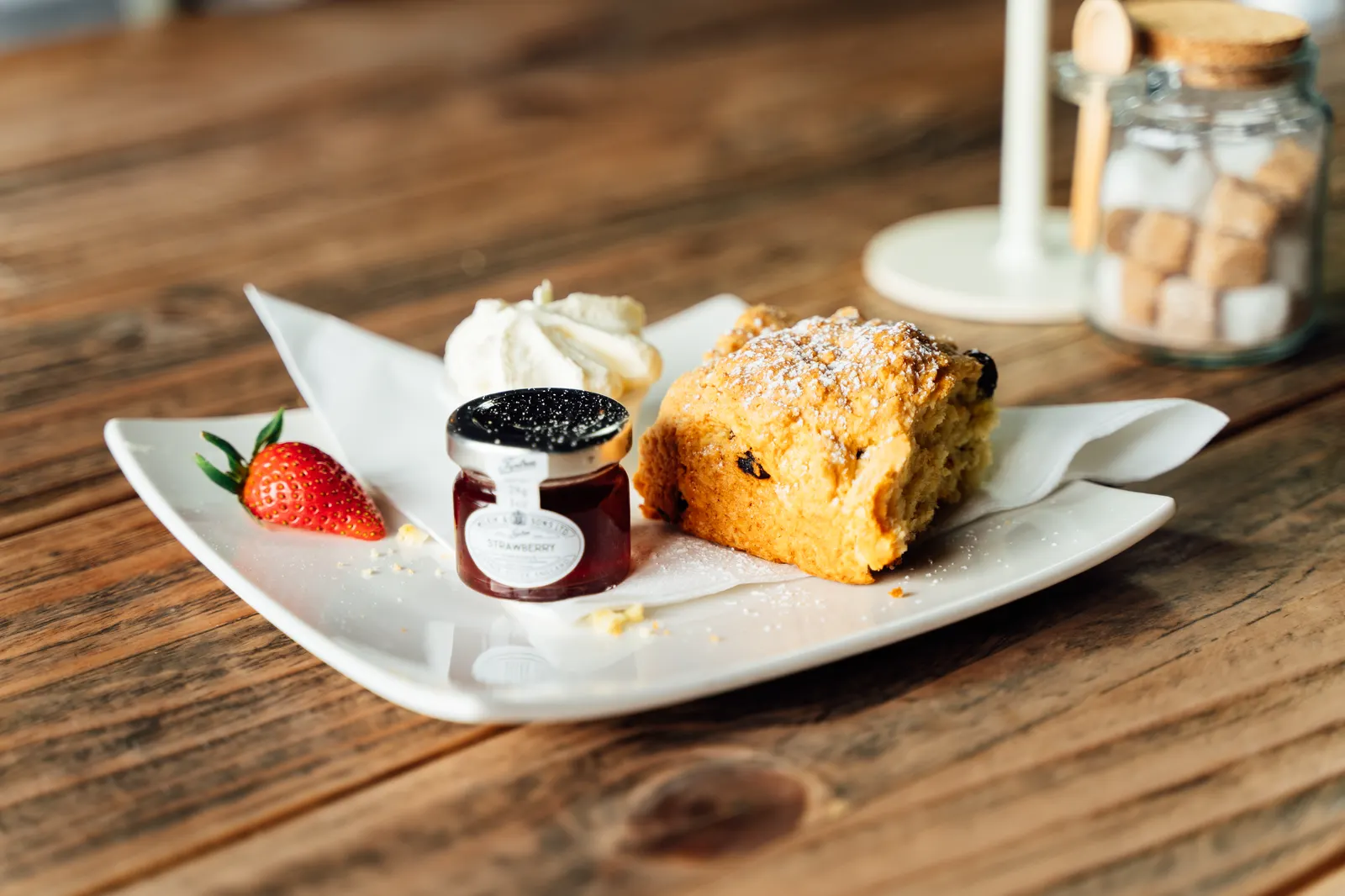 Welsh cake with jam and cream at The Boathouse café, Anglesey. Mona Digital food photography.