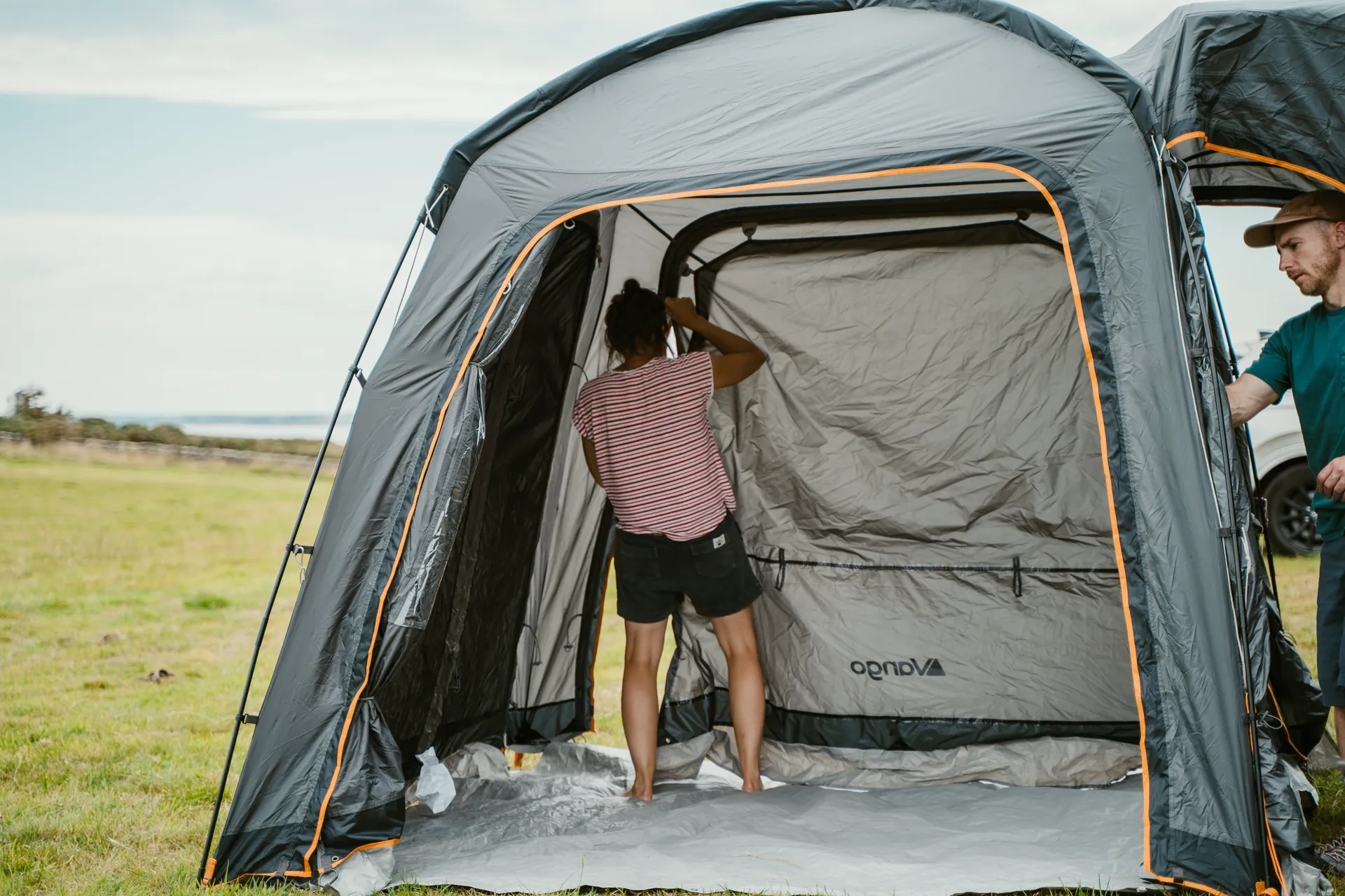 Folding Camper Vans July — drone aerial of workshop.
