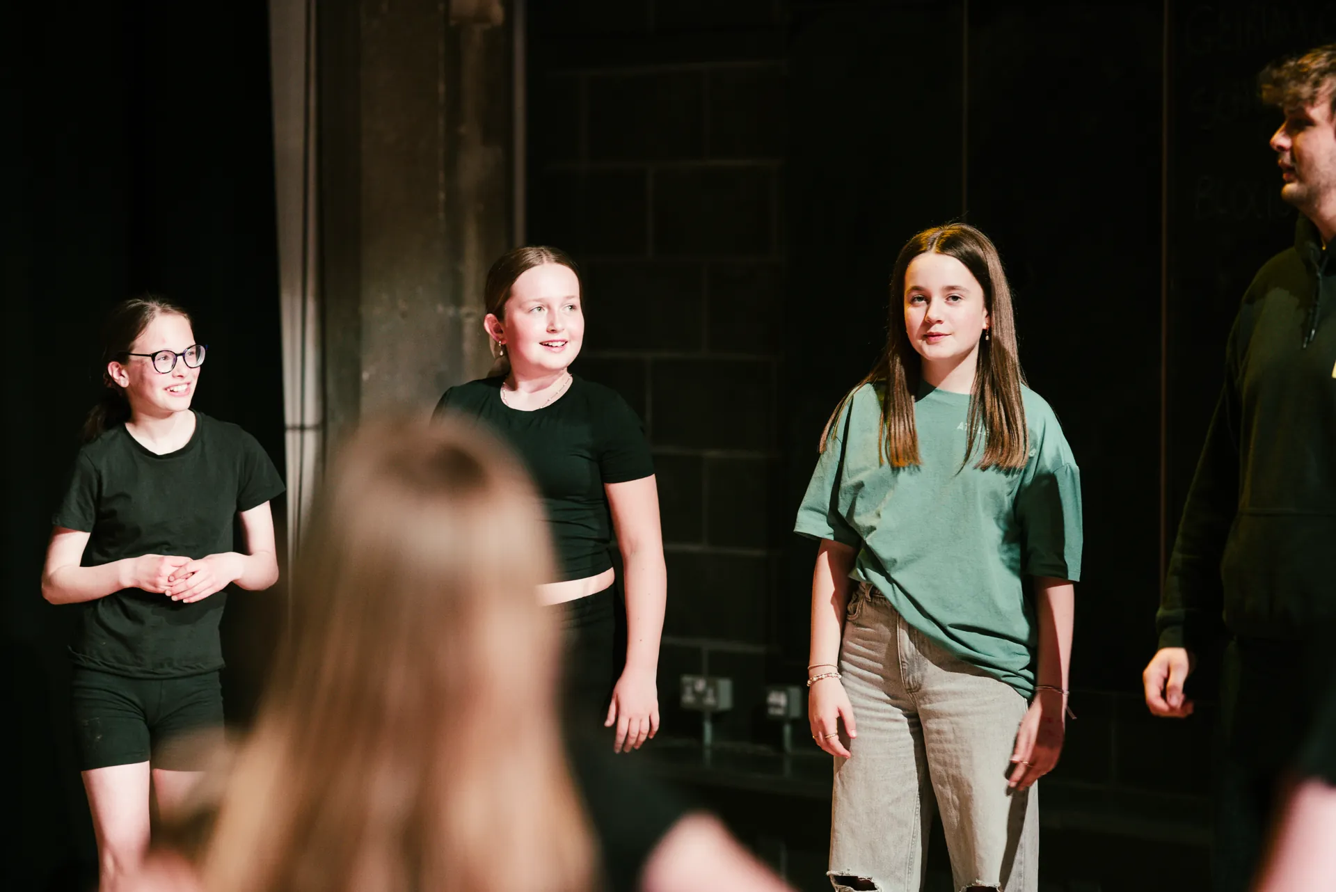 Fran Wen Cwmni Ifanc cast captured mid-scene — ensemble work.