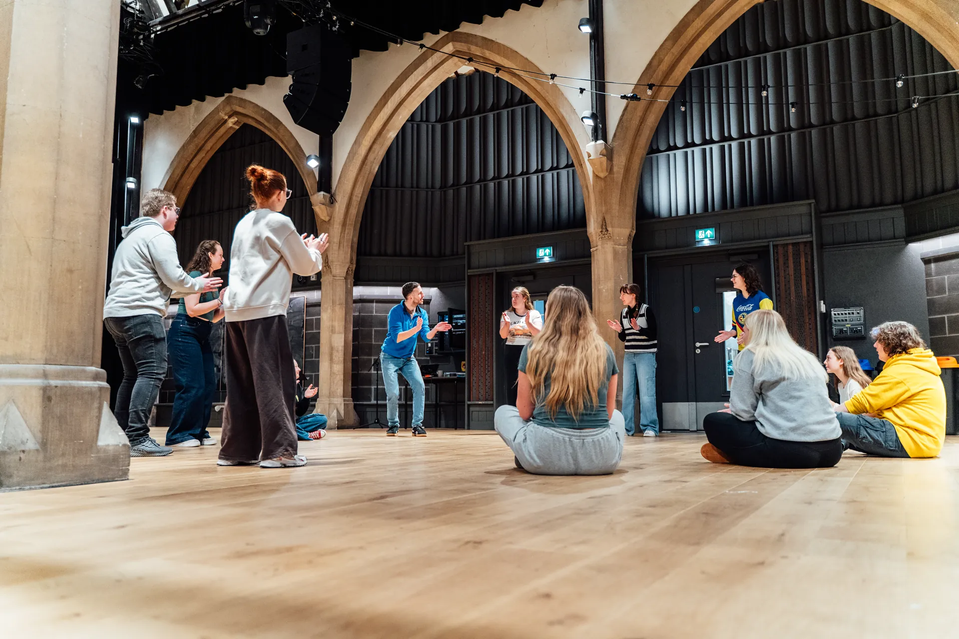 Pobl Ifanc workshop — teenagers in Welsh-language theatre rehearsal.