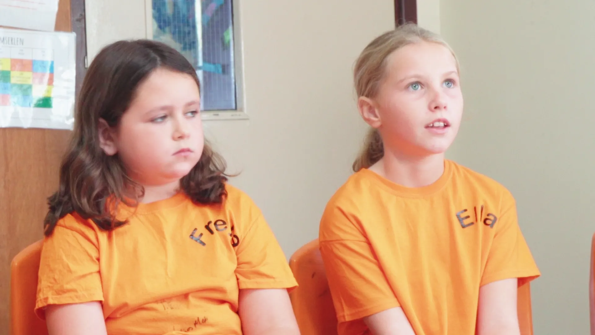 Two Ysgol Henblas pupils, Freya and Ella, photographed in their classroom for the Menter Môn community film about Hwyl Henblas 2024.