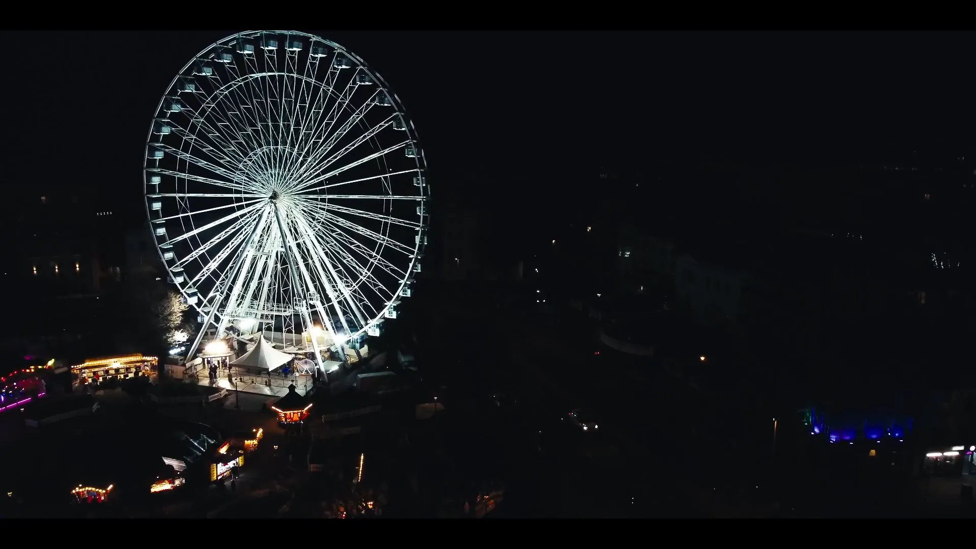 Wider aerial sweep of north Wales landscape — additional showreel frame demonstrating Mona Digital's CAA-PfCO drone work.